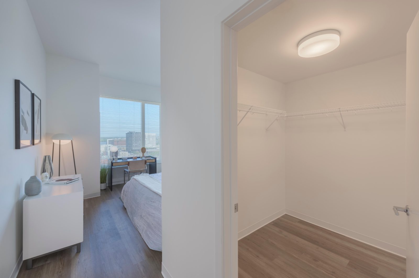 Bedroom with walk-in closet.