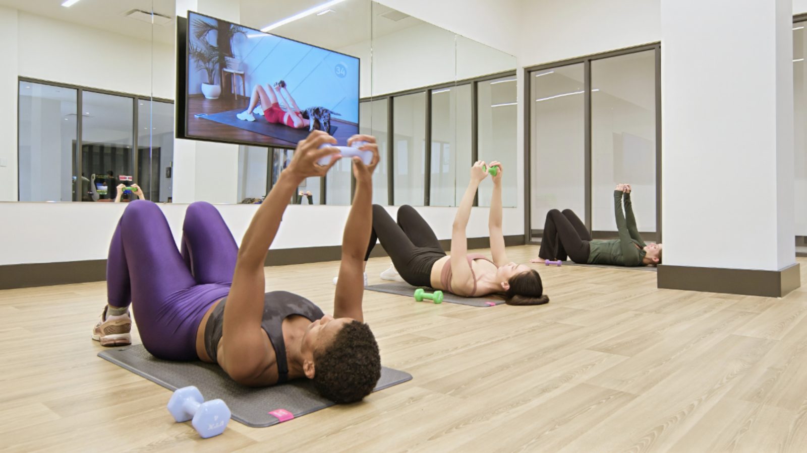 Residents working out in the yoga studio