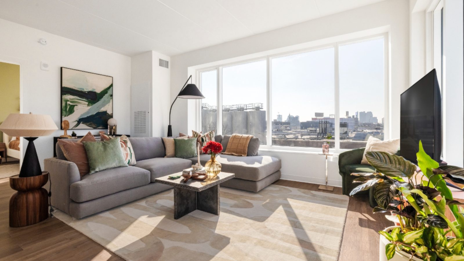 Living room with tall windows.